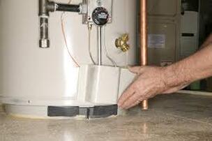 Plumber installing water heater 